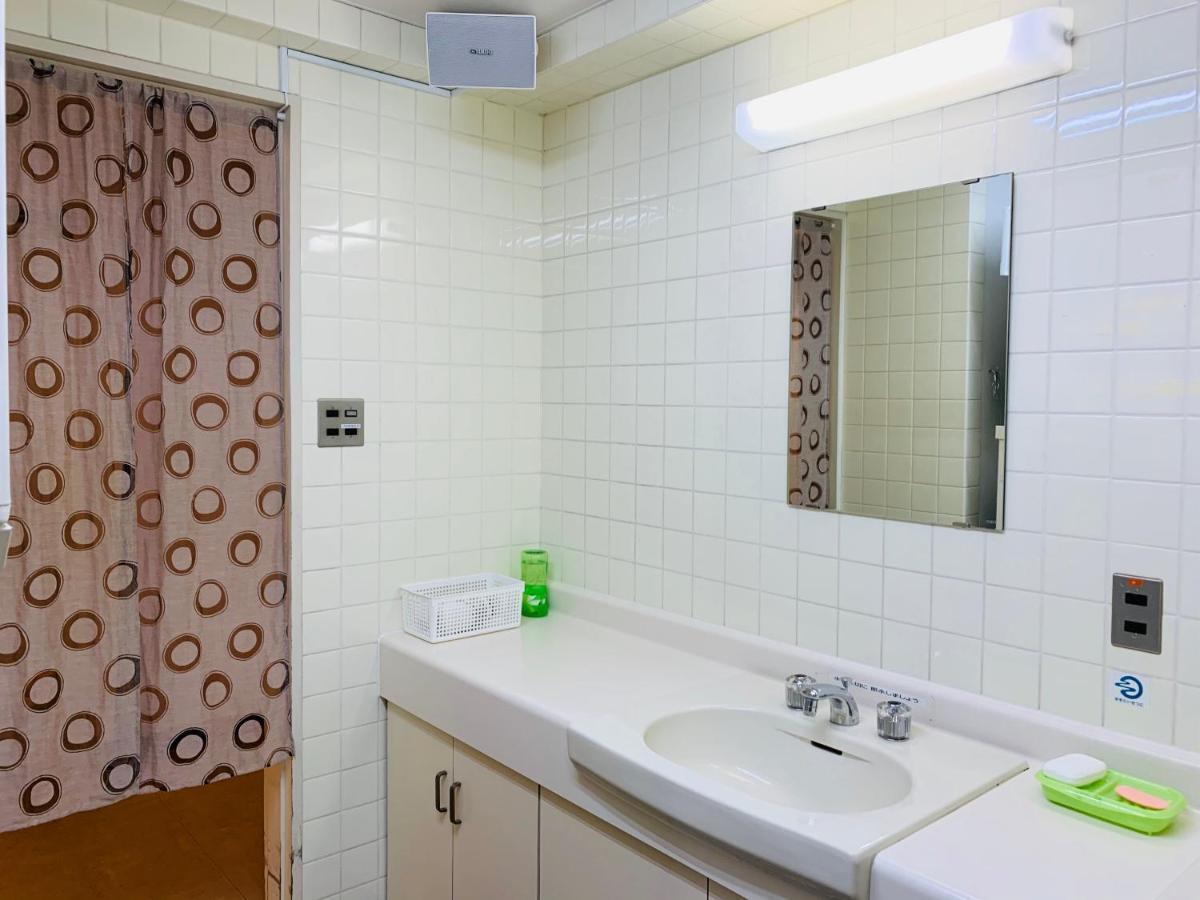 Guesthouse Shiawase Eki Fukuoka  Exterior photo