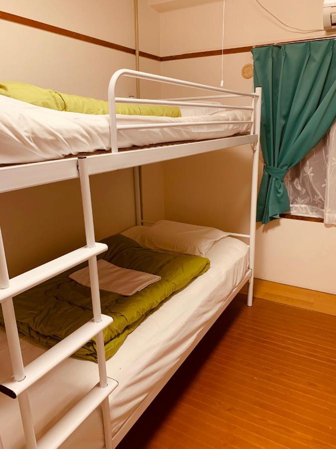 Guesthouse Shiawase Eki Fukuoka  Exterior photo