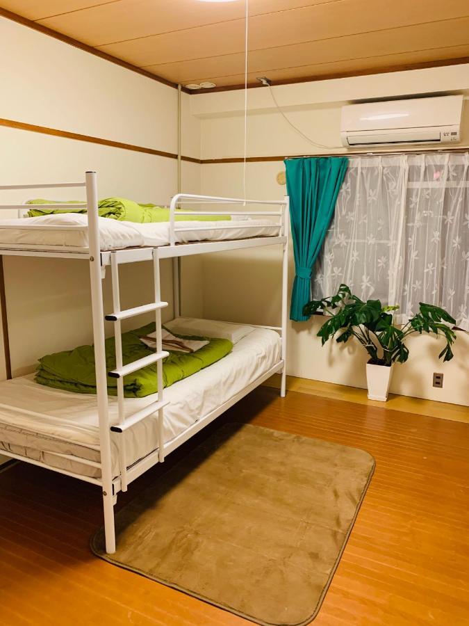 Guesthouse Shiawase Eki Fukuoka  Exterior photo